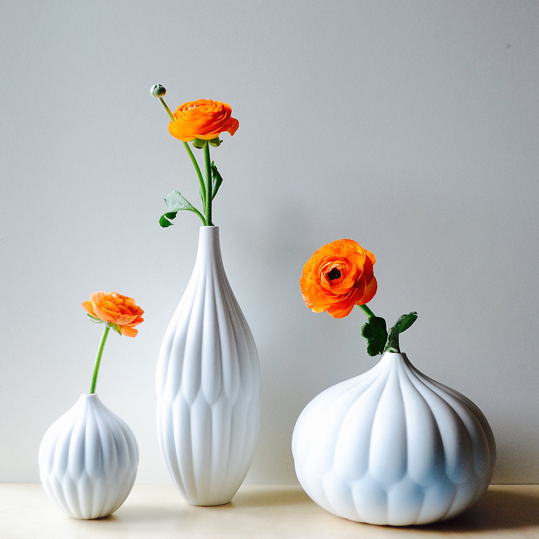 Tall textured porcelain flower vase with ceramic surface finish