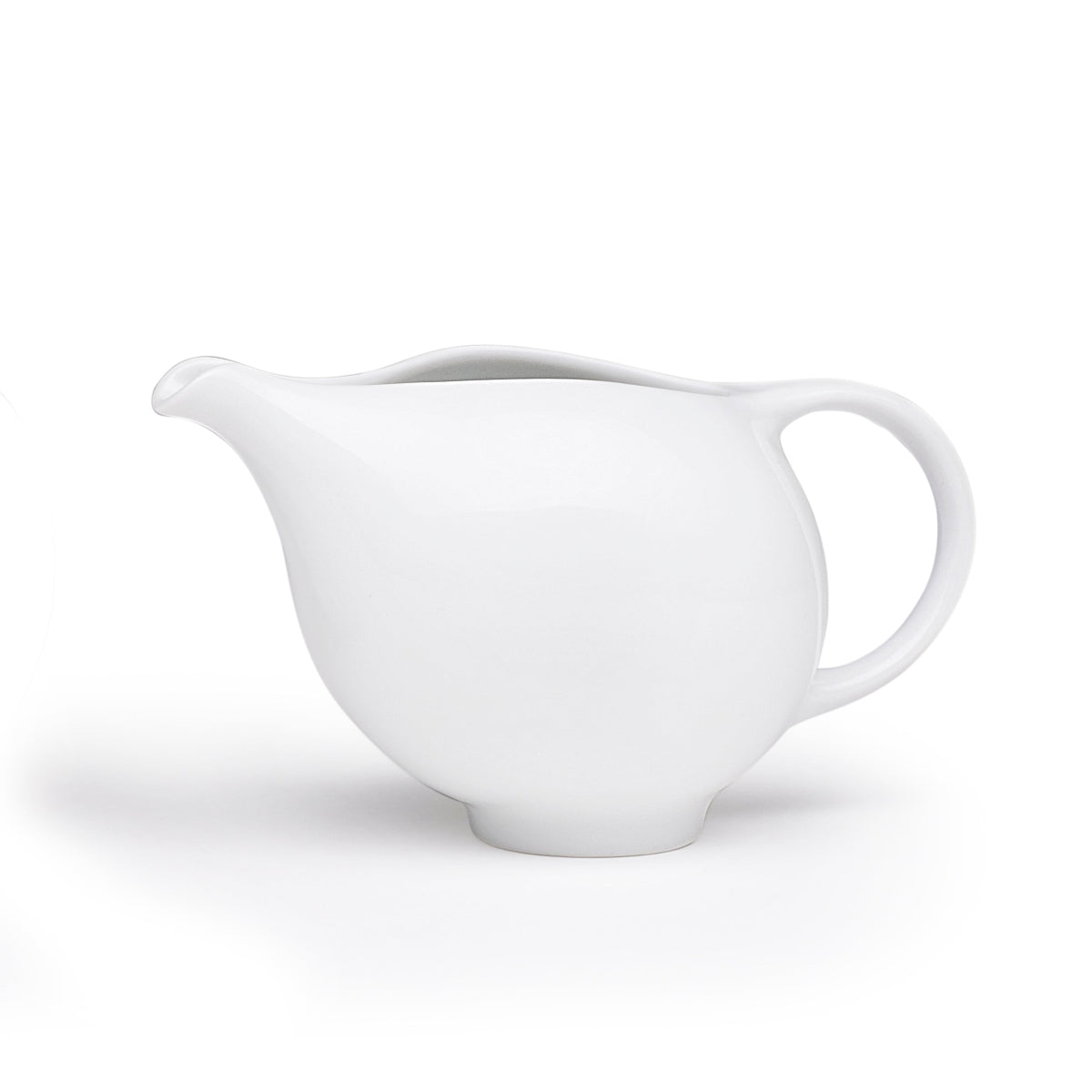 Glossy white ceramic creamer pitcher and sugar bowl set