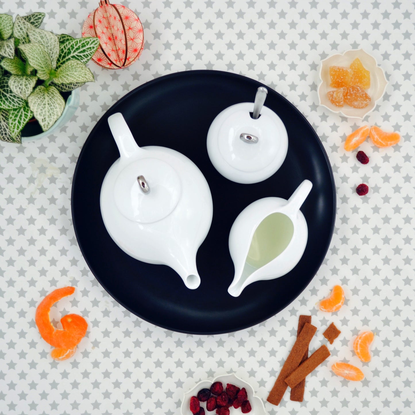 White porcelain Eva Zeisel teapot with mesh filter