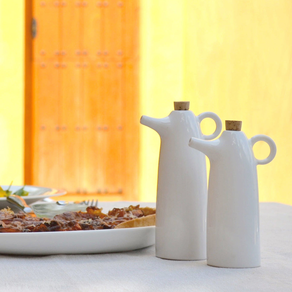 Ceramic oil and vinegar set with white stoneware cruets