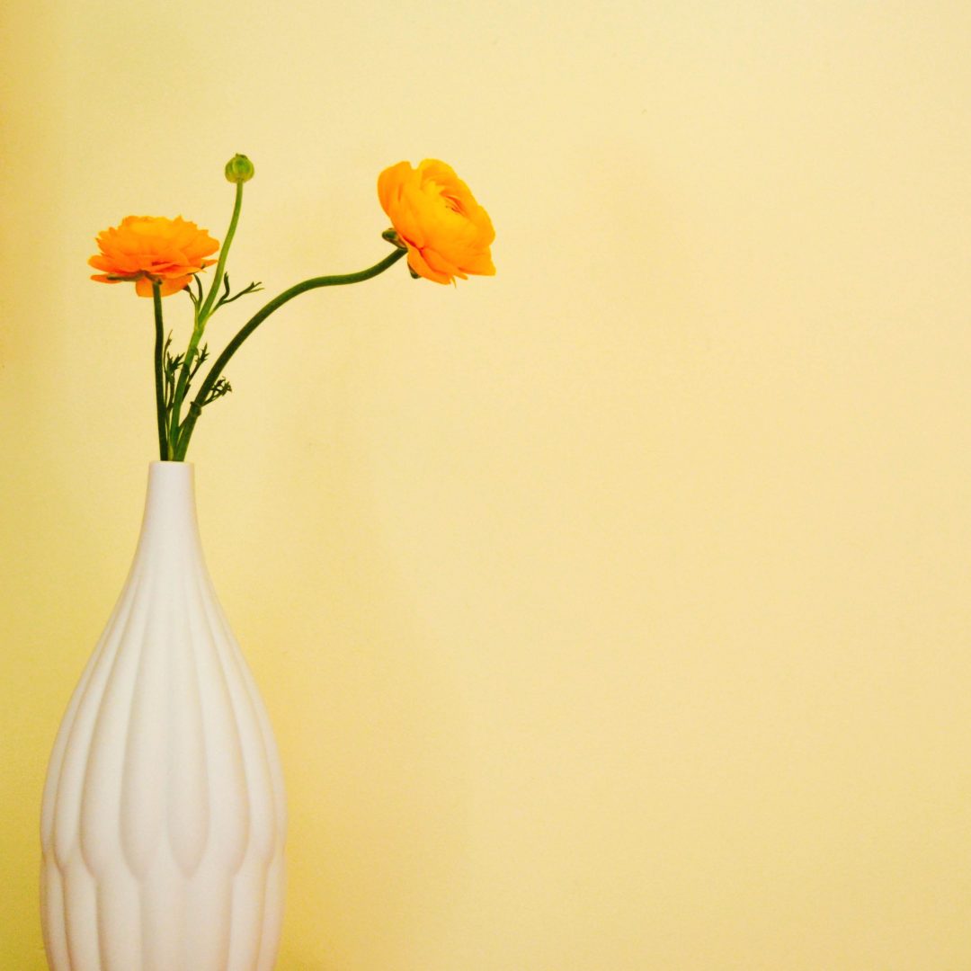 Tall textured porcelain flower vase with ceramic surface finish