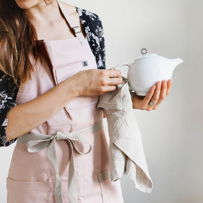 White porcelain Eva Zeisel teapot with mesh filter
