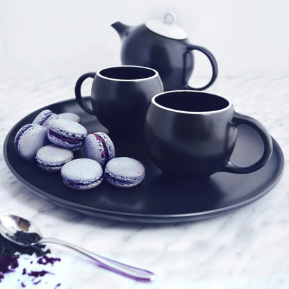 Black ceramic designer teapot with stainless steel filter