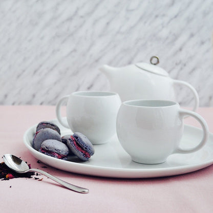White stoneware modern tea set with Eva Zeisel design
