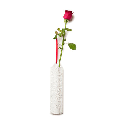 Porcelain hanging wall vase with engraved rose design