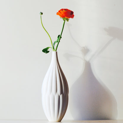 Tall textured porcelain flower vase with ceramic surface finish