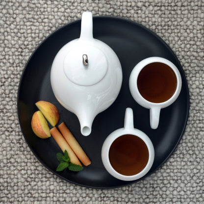 White stoneware modern tea set with Eva Zeisel design
